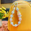 Creative cartoon Lilith beaded mobile phone chain, keychain, bag pendant, car key chain, doll pendant, gift, mobile phone chain, short style for women, European and American Specification image